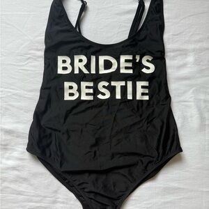 Spencer's Black Swimsuit with White Text